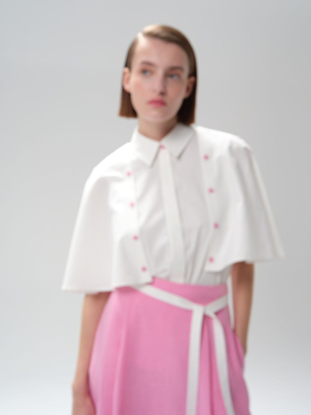 Modern and Elegant Pink Buttoned White Flounce Shirt